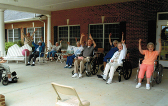 Elderly People Raising Hands